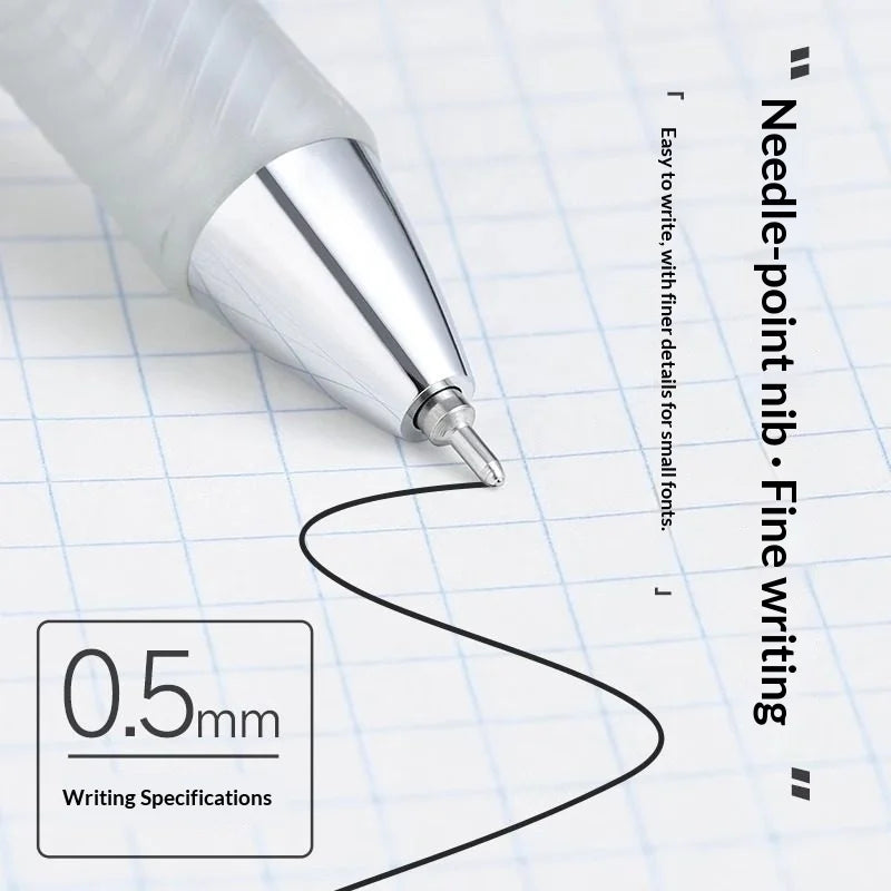 Silver pen with needle-point nib on graph paper, highlighting fine writing capabilities.