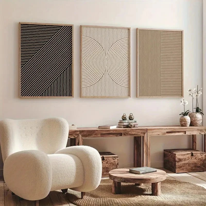 Modern living room with a white armchair, wooden coffee table, and abstract wall art.