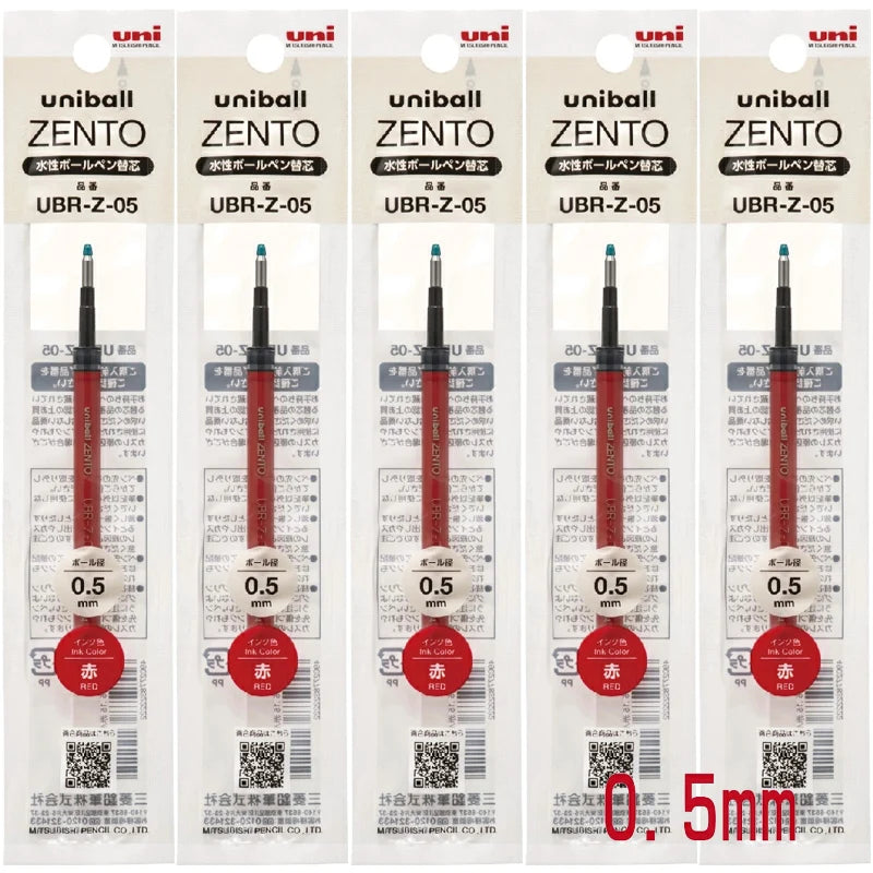 Five Uni-ball Zento ballpoint pen refills in packaging on a white background
