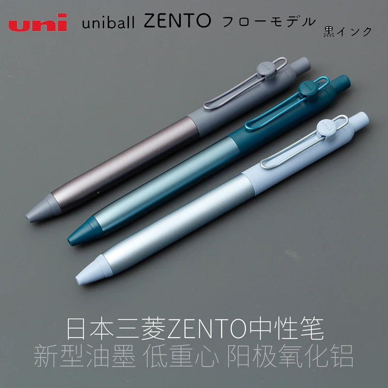 Three pens from Uni Mitsubishi Zento on a gray background